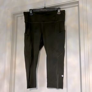 Olive colored Lululemon capris with three pockets. Very light weight.